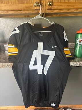 Nike Men’s Black Football Jersey with White Number and Yellow Sleeve Stripes